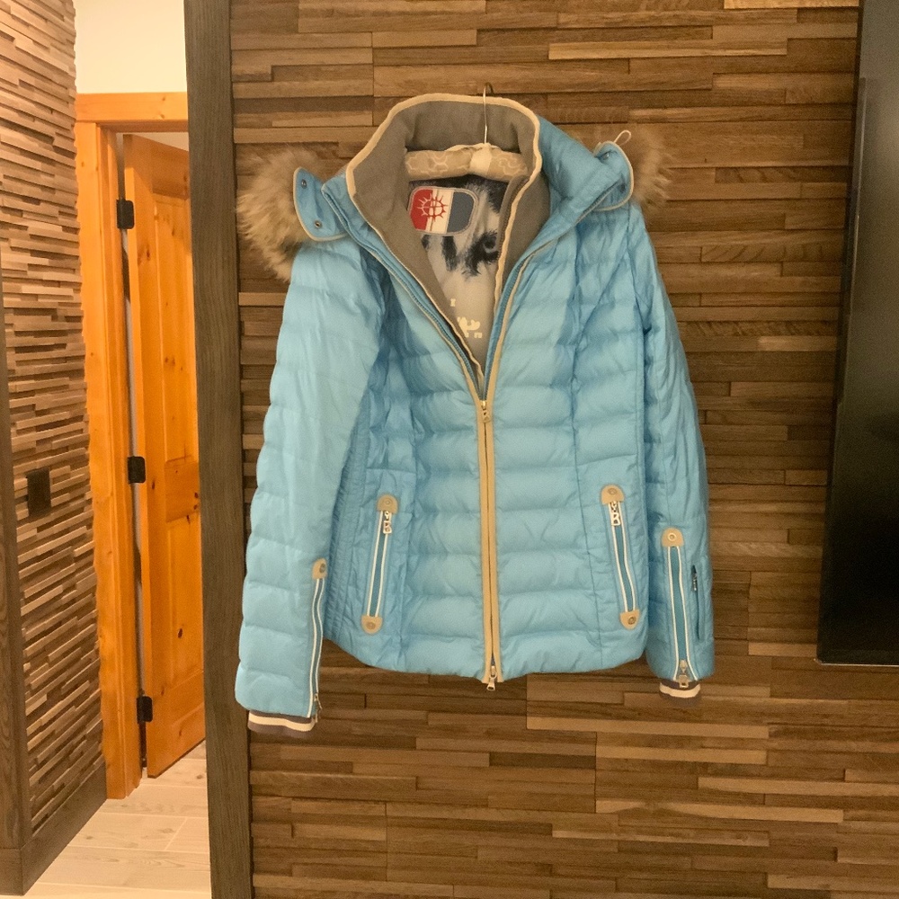 Bogner ski jacket. Size 14. In lite blue color with far hoodie